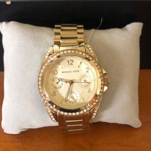 gold tone Michael Kors watch